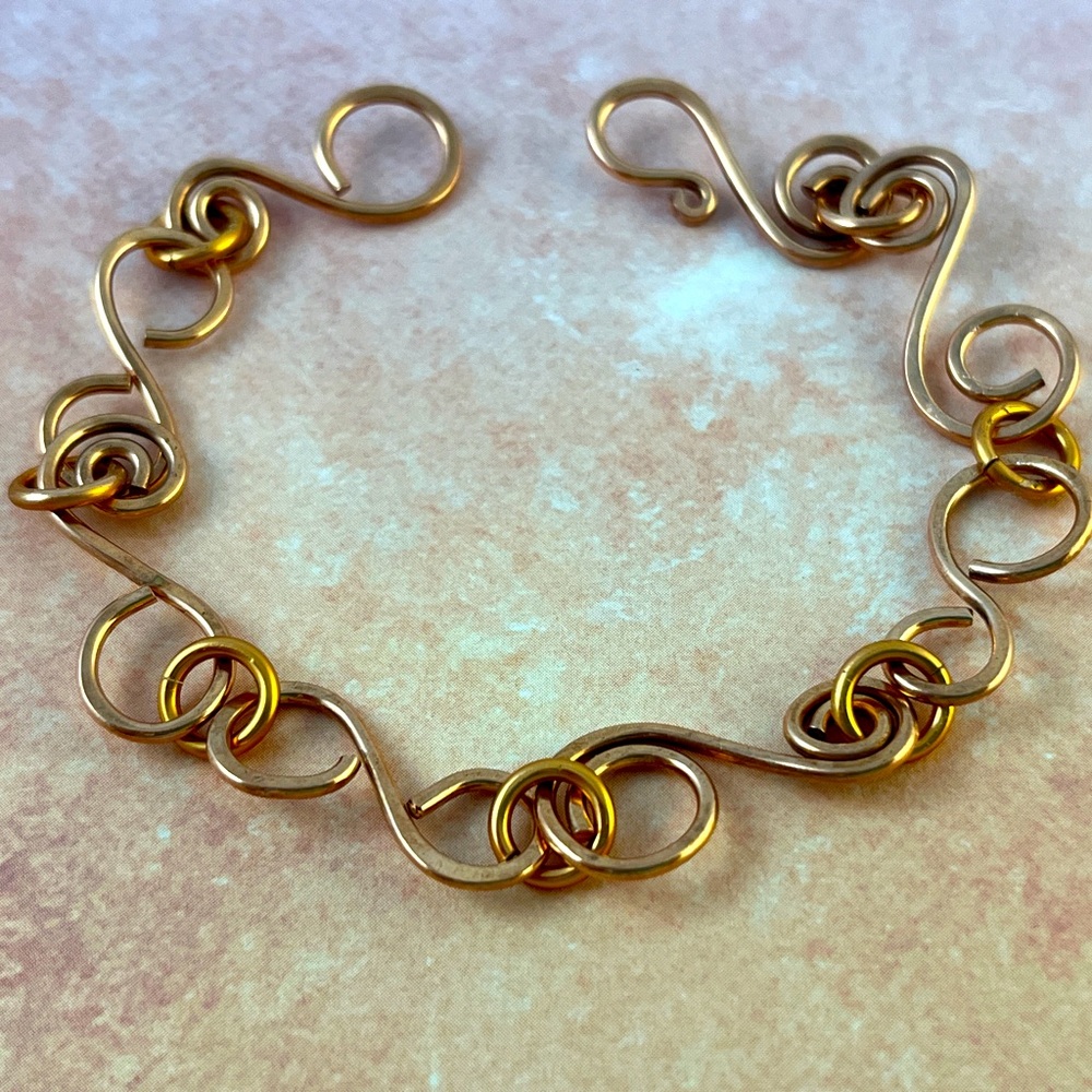 Cute brass bracelet made with 14 gauge wire. Can be made in any size.